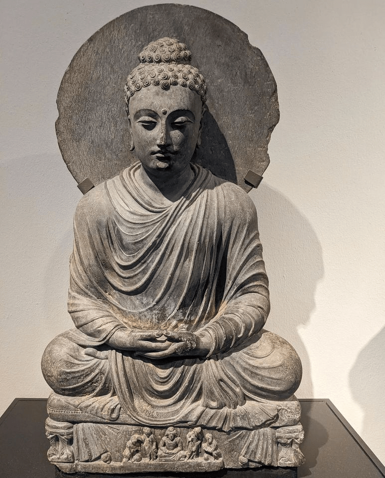 Buddha in Dhyana Mudra, circa 200-400 CE, Kushan Period, Pakistan, Gandhara School of Art, housed in the Victoria and Albert Museum, London.