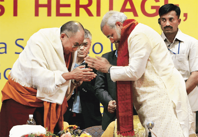 PM Modi and HH Dalai Lama greeting each other (File) 